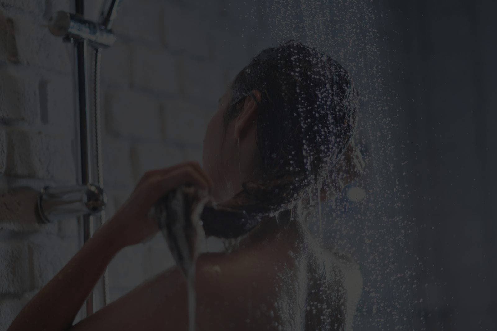 Soft water flowing from shower — no-salt hard water treatment